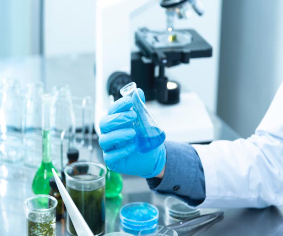 a medical scientist mixing a substance
